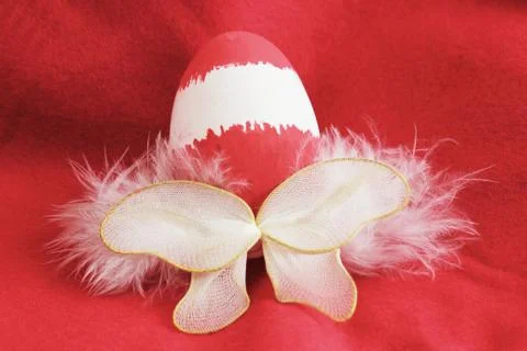 Red easter egg fairy with wings Stock Photos