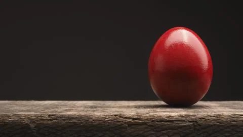 Red Easter egg on a rustic wooden table with space for text or image, Happy 스톡 사진
