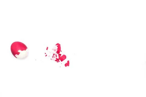 Red Easter egg with shell on white background concept of the symbol of the Фото