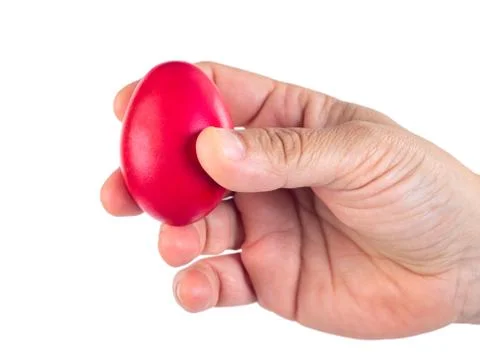 Red Easter egg in woman's hand isolated on white Stock Photos