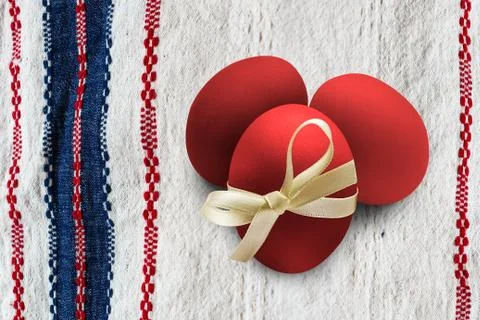 Red Easter Eggs on cloth Stock Photos