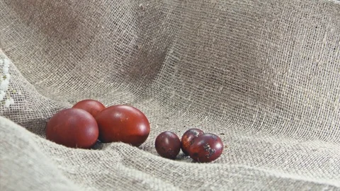 Red Easter eggs on a fabric background Видео 73456487