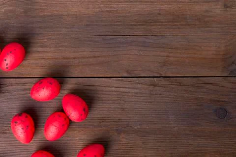 Red Easter eggs on wooden background Stock Photos