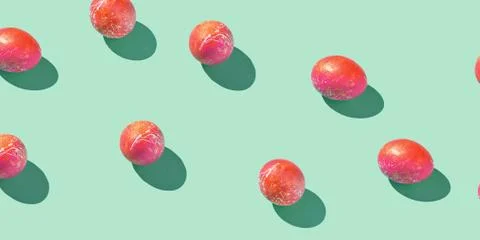 Red eggs. Pattern at green background. Easter concept 스톡 사진