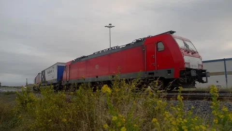 Red Electric Freight Locomotive Pulling Intermodal Trailers Stock Footage 337904369