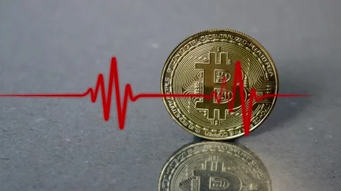 Red electrocardiogram and Bitcoin. Stock Footage 232600501