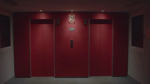 Red Elevator Doors Closing and Opening Repeatedly Stock Footage 300585462