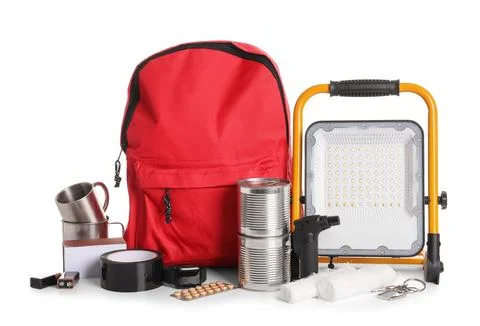 Red emergency backpack with necessities on white background Stock Photos