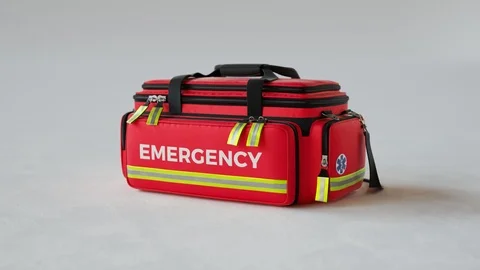 The red emergency first aid bag in studio light. Close up on a paramedic kit4KHD Stock Footage 112598280