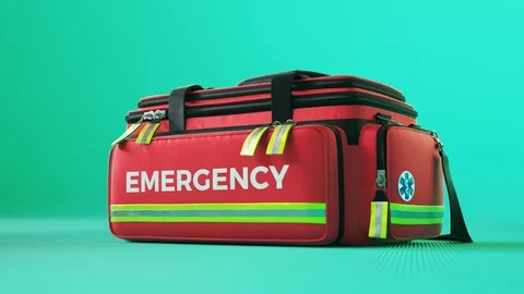 The red emergency first aid bag in colorful studio light. Paramedic kit. 4KHD Stock Footage 112600251