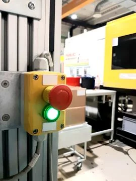 Red-emergency-stop-button-factory-photo-03 Stock Photos