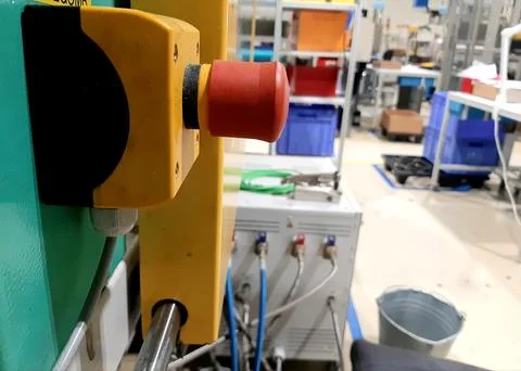 Red-emergency-stop-button-factory-photo-04 Stock Photos