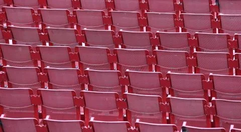 Red empty chairs in the stadium 스톡 사진