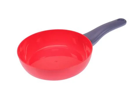 Red empty frying pan with a gray handle, on a white background Stock Photos