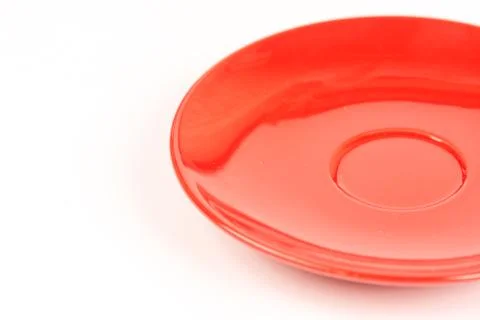 Red empty plate isolated above white background Stock Photos
