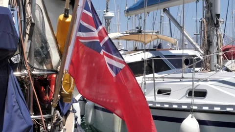 Red ensign flag fluttering on sailboat Stock Footage 340023825