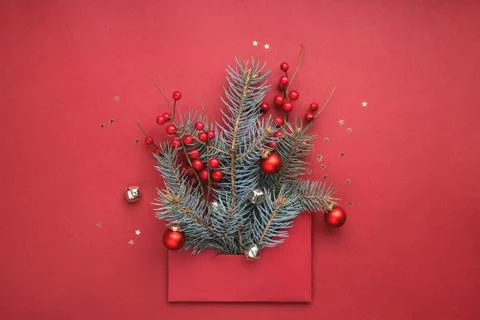 Red envelope with concept of Christmas tree. Stock Photos