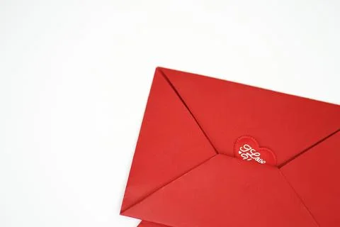 Red envelope with a declaration of love on a white background Stock Photos