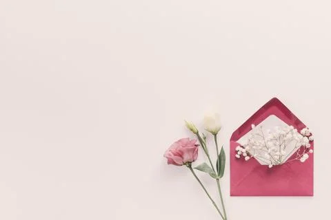 Red envelope with flower branches table . High quality and resolution beaut.. Stock Photos