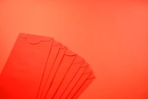 Red envelope on red background for design Stock Photos