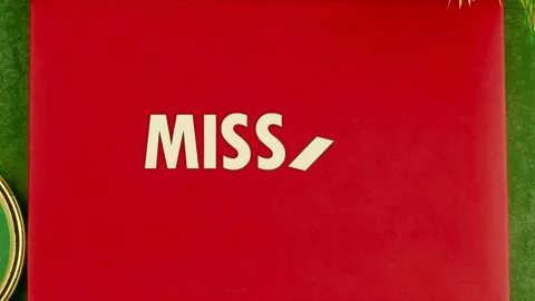 A red envelope is shown on a table. The word mis appears first, then changes to Stock Footage 342187889