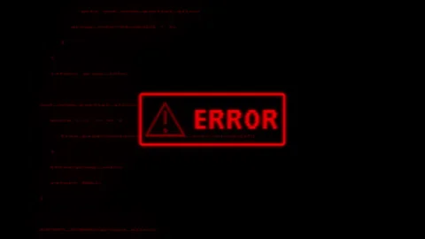 Red error message flashing on computer screen with code in background.  Stockbeeldmateriaal 316158985