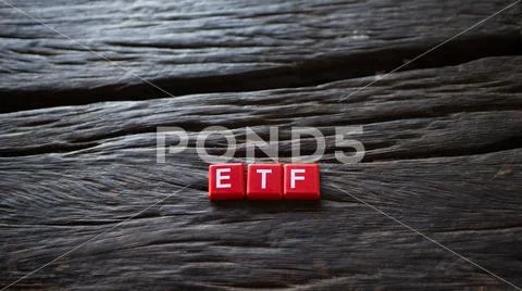 Red ETF Text lay on a wooden floor, Concept Guidelines for Digital Funding. Stock Photos
