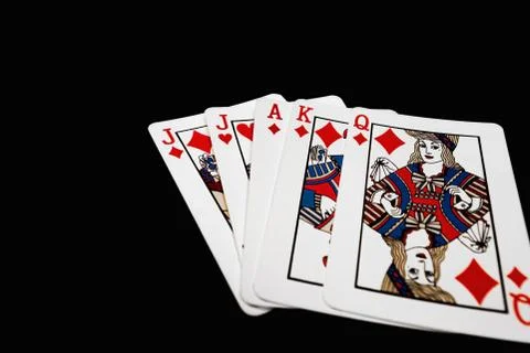 Red euchre diamond hand on black background Stock Photos
