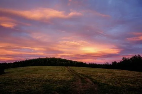 Red evening clouds over beautiful Slovak landscape Stock Photos