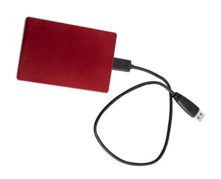 Red external hard disk storage backup drive for computer isolated on white .. Stock Photos