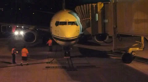 Red Eye Flight Arrival 2 Stock Footage 23271361