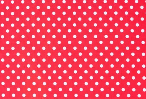 Red fabric background texture with white polka dots Stock Photos