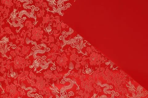 Red fabric with dragon pattern with Red envelope, copy space Stock Photos