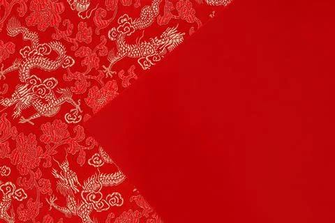 Red fabric with dragon pattern with Red envelope, copy space Stock Photos