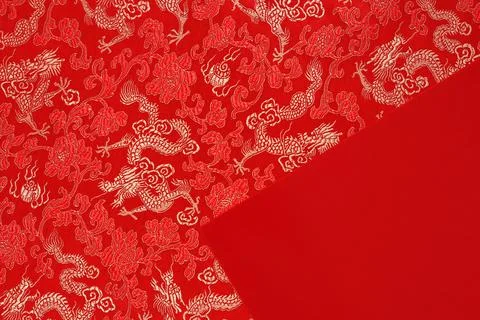 Red fabric with dragon pattern with Red envelope, copy space Stock Photos