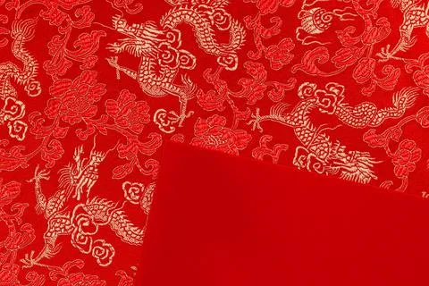 Red fabric with dragon pattern with Red envelope, copy space Stock Photos