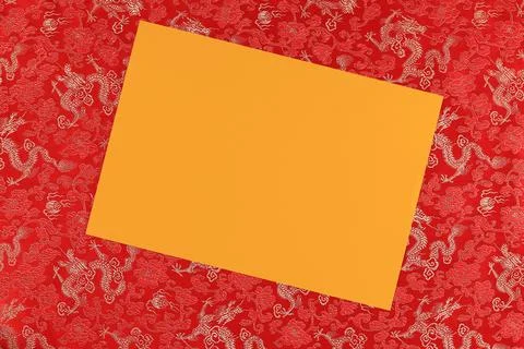 Red fabric with dragon pattern with yellow copy space for text. Stock Photos