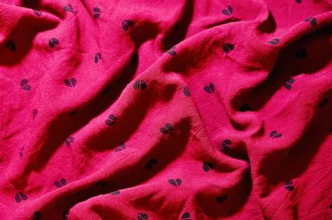 Red Fabric with Heart Pattern Background with Soft Waves 写真素材