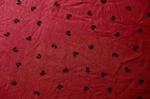Red Fabric with Heart Pattern Background with Soft Waves 写真素材