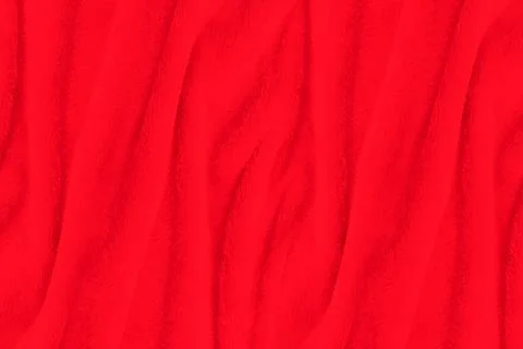 Red fabric texture background. Abstract cloth backdrop with soft waves. Stock Photos