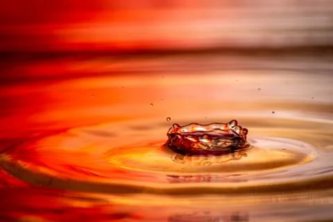 Red falling splash Stock Photos