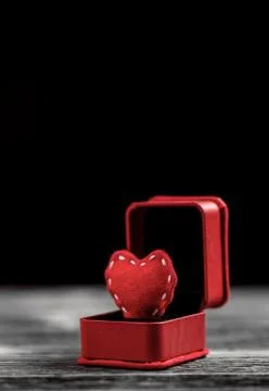 Red felt heart in ring box Stock Photos