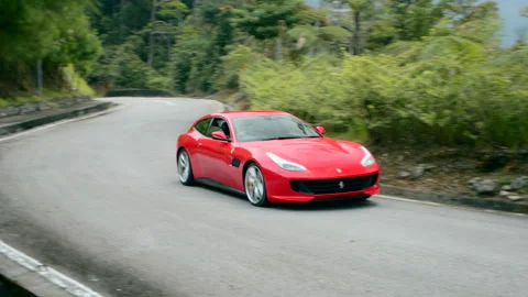 Red Ferrari driving Vídeo Stock 151904948