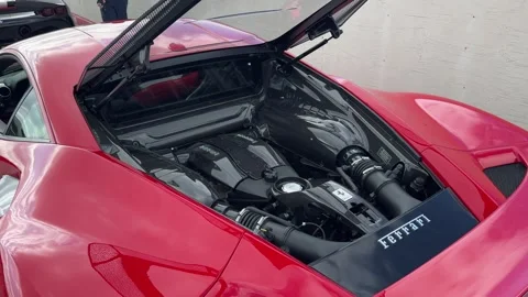 Red Ferrari rear engine close up 库存影片 346558986