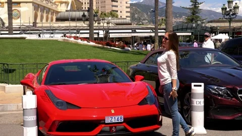 Red Ferrari Supercar Outside Monte Carlo Casino in Monaco 4K Stock-Footage 343510872