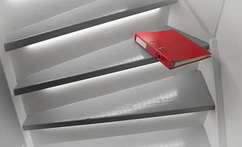 Red file on the stairs, selective focus Stock Photos