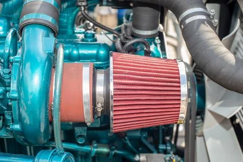 Red Filter in new tractor engine. industrial photo Fotos Stock