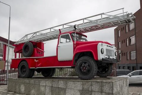Red fire engine as monument Red fire engine as monument Stock Photos