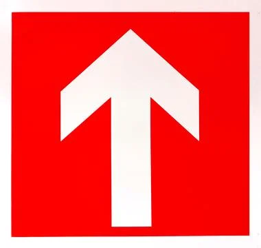 The red Fire exit sign indicates the direction of evacuation. Ilustración de archivo