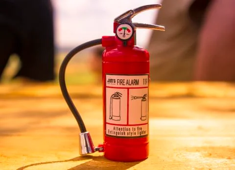 Red fire extinguisher Stock Photos